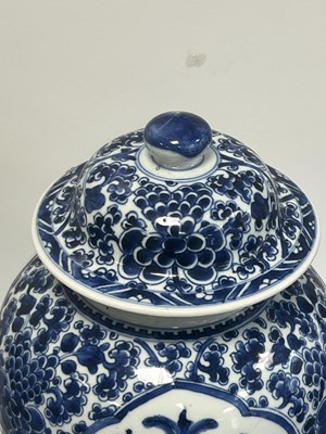 Lot 522 - A PAIR OF KANGXI PERIOD CHINESE BLUE AND WHITE BALUSTER VASES AND COVERS