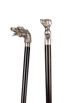 Lot 852 - TWO LATE 19TH CENTURY SILVER DOG'S HEAD HANDLED WALKING STICKS