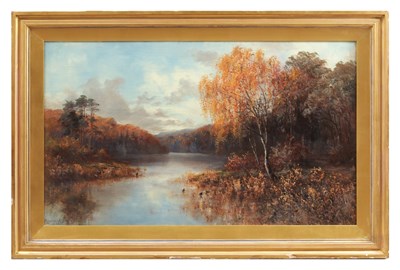 Lot 752 - DOUGLAS ADAMS (BRITISH 1853-1920) AN OIL ON CANVAS AUTUMNAL RIVER LANDSCAPE