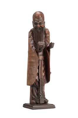 Lot 529 - A 19TH CENTURY CHINESE CARVED HARDWOOD FIGURE OF SHOU LAO