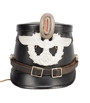 Lot 624 - A WWII GERMAN POLICE SHAKO HELMET
