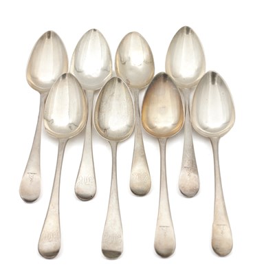 Lot 91 - A COLLECTION OF EIGHT GEORGIAN ENGLISH SILVER SERVING SPOONS