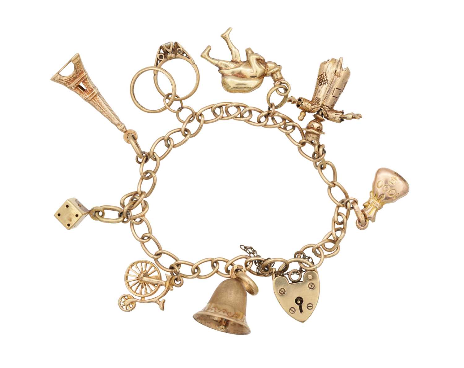 Lot 237 - A 9CT YELLOW GOLD CHARM BRACELET WITH HEART PADLOCK CLASP