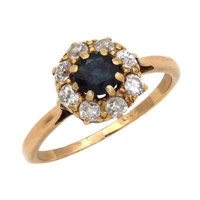 Lot 240 - A 14CT YELLOW GOLD SAPPHIRE AND DIAMOND RING