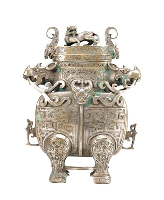 Lot 459 - A CHINESE SILVERED BRONZE ARCHAISTIC LIDDED VESSEL WITH QILIN FINIAL