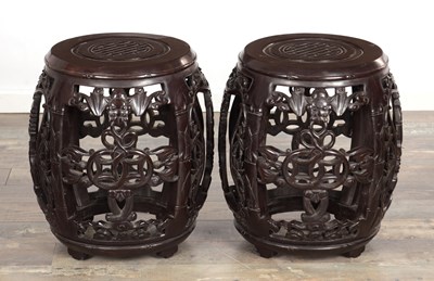 Lot 508 - A PAIR OF CHINESE CARVED HARDWOOD GARDEN SEATS