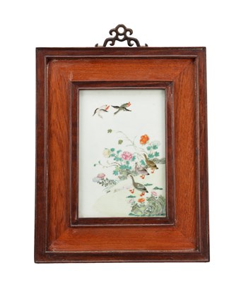 Lot 598 - A CHINESE FAMILLE ROSE PORCELAIN PANEL IN A HARDWOOD FRAME