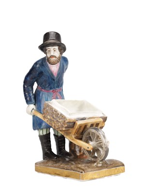 Lot 63 - ATT A 19TH CENTURY RUSSIAN GARDNER PORCELAIN FIGURE OF A PEASANT WITH A WHEELBARROW
