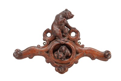 Lot 829 - A LATE 19TH CENTURY BLACK FOREST CARVED WOOD COAT RACK WITH BEAR FAMILY