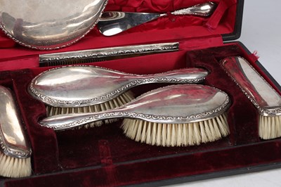 Lot 6 - A VICTORIAN SILVER DRESSING TABLE SET IN FITTED CASE