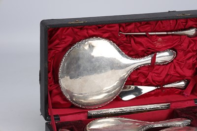 Lot 6 - A VICTORIAN SILVER DRESSING TABLE SET IN FITTED CASE