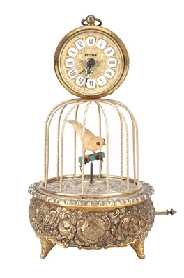 Lot 1306 - A MID 20TH CENTURY ESTYMA GILT METAL SINGING BIRD CAGE CLOCK