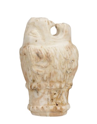 Lot 885 - A 19TH CENTURY CARVED STONE LION’S HEAD WITH PIERCED APERTURE
