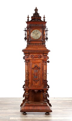Lot 1231 - A LATE 19TH CENTURY GERMAN WALNUT SYMPHONION MUSICAL LONGCASE CLOCK