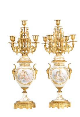 Lot 934 - A PAIR OF LATE 19TH CENTURY FRENCH PORCELAIN AND GILT METAL MOUNTED FOUR BRANCH CANDELABRA