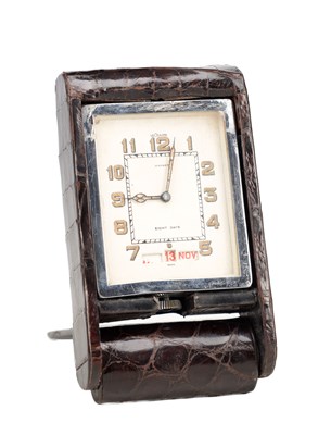 Lot 1329 - A MID 20TH CENTURY SWISS CROCODILE LEATHER EIGHT DAY TRAVELLING CLOCK BY JAEGER-LECOULTRE