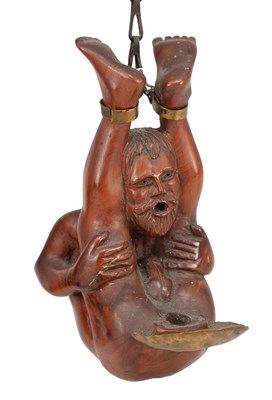 Lot 1049 - AN UNUSUAL 19TH CENTURY CARVED FRUITWOOD HANGING LAMP OF A SUPPLE GENTLEMAN