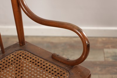 Lot 1516 - AN EARLY 20TH CENTURY AMERICAN CHILD'S HIGH CHAIR WITH CANE SEAT