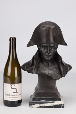 Lot A PATINATED BRONZE BUST OF NAPOLEON ON A MARBLE PLINTH