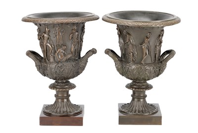 Lot A PAIR OF 19TH CENTURY PATINATED BRONZE CAMPANA URNS WITH CLASSICAL FIGURE RELIEF ON SQUARE PLINTH BASES