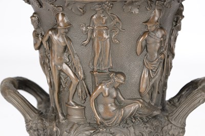 Lot A PAIR OF 19TH CENTURY PATINATED BRONZE CAMPANA URNS WITH CLASSICAL FIGURE RELIEF ON SQUARE PLINTH BASES