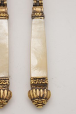 Lot 34 - A RARE PAIR OF 19TH CENTURY FRENCH SILVER GILT TRAVELLING SPOON AND FORK WITH MOTHER-OF-PEARL HANDLES