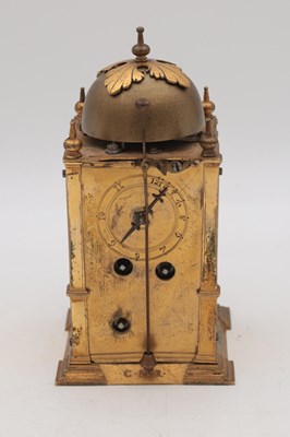 Lot 1301 - AN EARLY 17TH CENTURY GERMAN GILT CASED STRIKING TABLE CLOCK