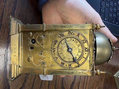 Lot 1301 - AN EARLY 17TH CENTURY GERMAN GILT CASED STRIKING TABLE CLOCK