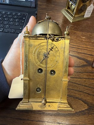 Lot 1301 - AN EARLY 17TH CENTURY GERMAN GILT CASED STRIKING TABLE CLOCK