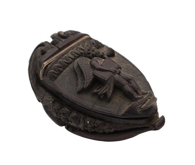 Lot 1428 - AN EARLY 19TH CENTURY COQUILLA NUT BUGBEAR SNUFF BOX