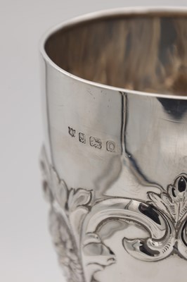 Lot 100 - A SILVER TROPHY CUP WITH REPOUSSE DECORATION