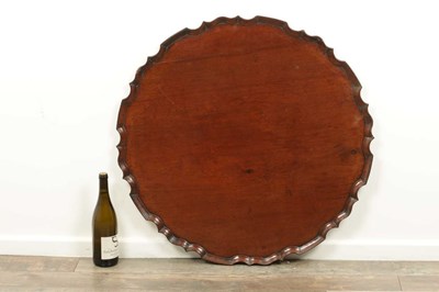 Lot 1560 - A LARGE GEORGE III MAHOGANY CIRCULAR TRAY