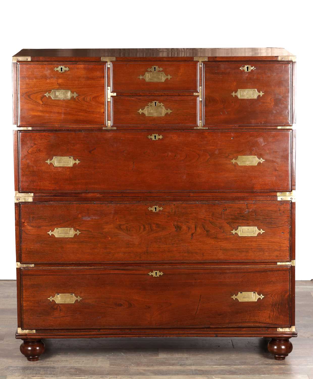 Lot 1533 - AN UNUSUALLY LARGE MID 19TH CENTURY CAMPHORWOOD CAMPAIGN CHEST WITH BRASS RECESSED HANDLES