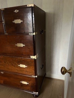 Lot 1533 - AN UNUSUALLY LARGE MID 19TH CENTURY CAMPHORWOOD CAMPAIGN CHEST WITH BRASS RECESSED HANDLES