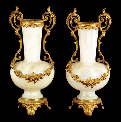 Lot 554 - A PAIR OF LATE 19TH CENTURY OPAQUE GLASS AND ORMOLU MOUNTED VASES