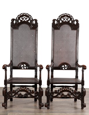 Lot 1583 - A PAIR OF WILLIAM AND MARY WALNUT HIGH-BACK CANED ARMCHAIRS