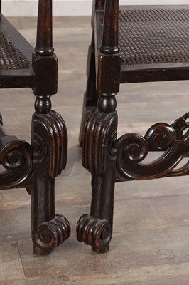 Lot 1583 - A PAIR OF WILLIAM AND MARY WALNUT HIGH-BACK CANED ARMCHAIRS