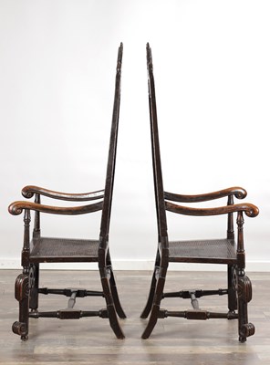 Lot 1583 - A PAIR OF WILLIAM AND MARY WALNUT HIGH-BACK CANED ARMCHAIRS