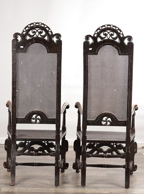 Lot 1583 - A PAIR OF WILLIAM AND MARY WALNUT HIGH-BACK CANED ARMCHAIRS