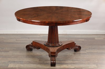 Lot 1601 - A WILLIAM IV FLAMED MAHOGANY CIRCULAR TABLE WITH A SEGMENTED FANNED TOP