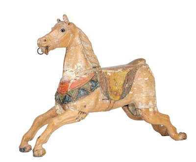 Lot 1142 - AN EARLY 20TH CENTURY CARVED AND PAINTED WOOD CAROUSEL HORSE