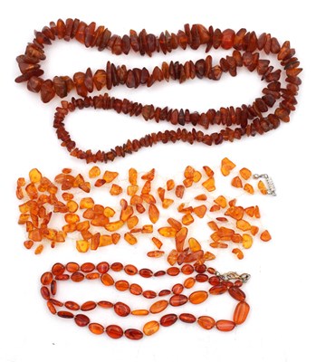 Lot 222 - A COLLECTION OF THREE AMBER NECKLACES