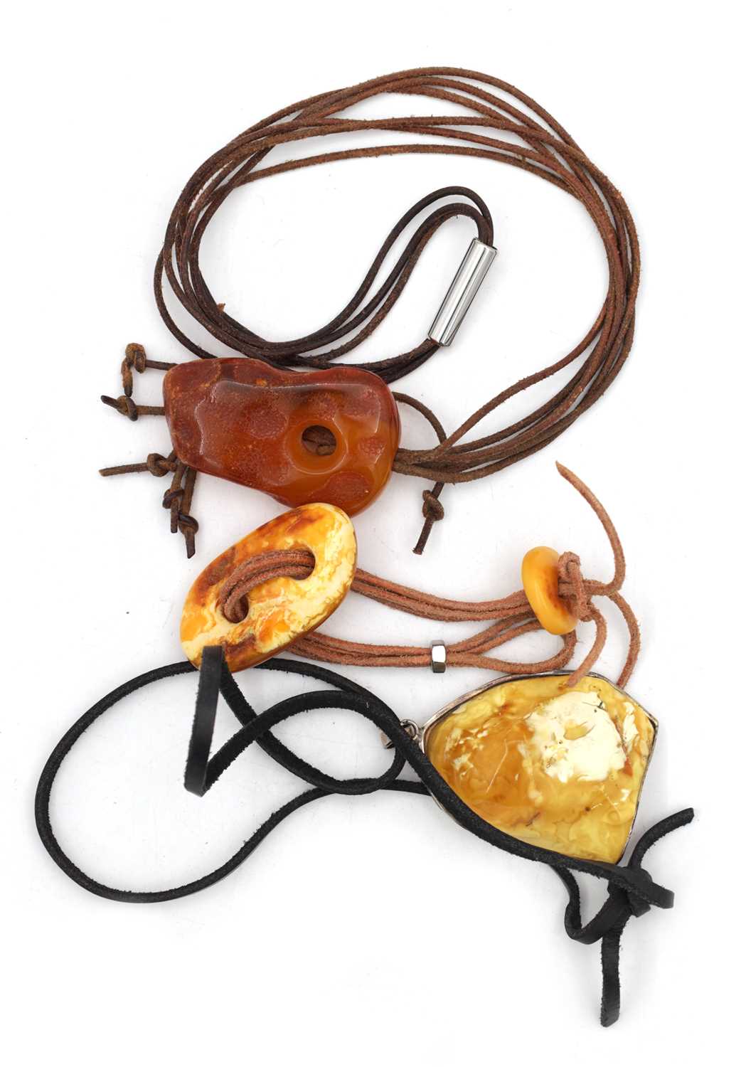 Lot 254 - A COLLECTION OF THREE AMBER NECKLACES