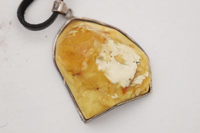 Lot 254 - A COLLECTION OF THREE AMBER NECKLACES