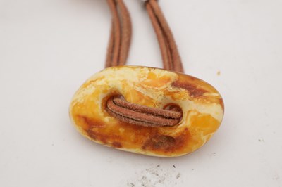 Lot 254 - A COLLECTION OF THREE AMBER NECKLACES