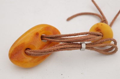 Lot 254 - A COLLECTION OF THREE AMBER NECKLACES