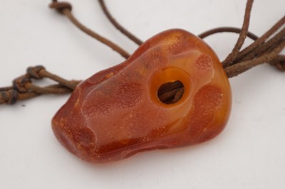Lot 254 - A COLLECTION OF THREE AMBER NECKLACES