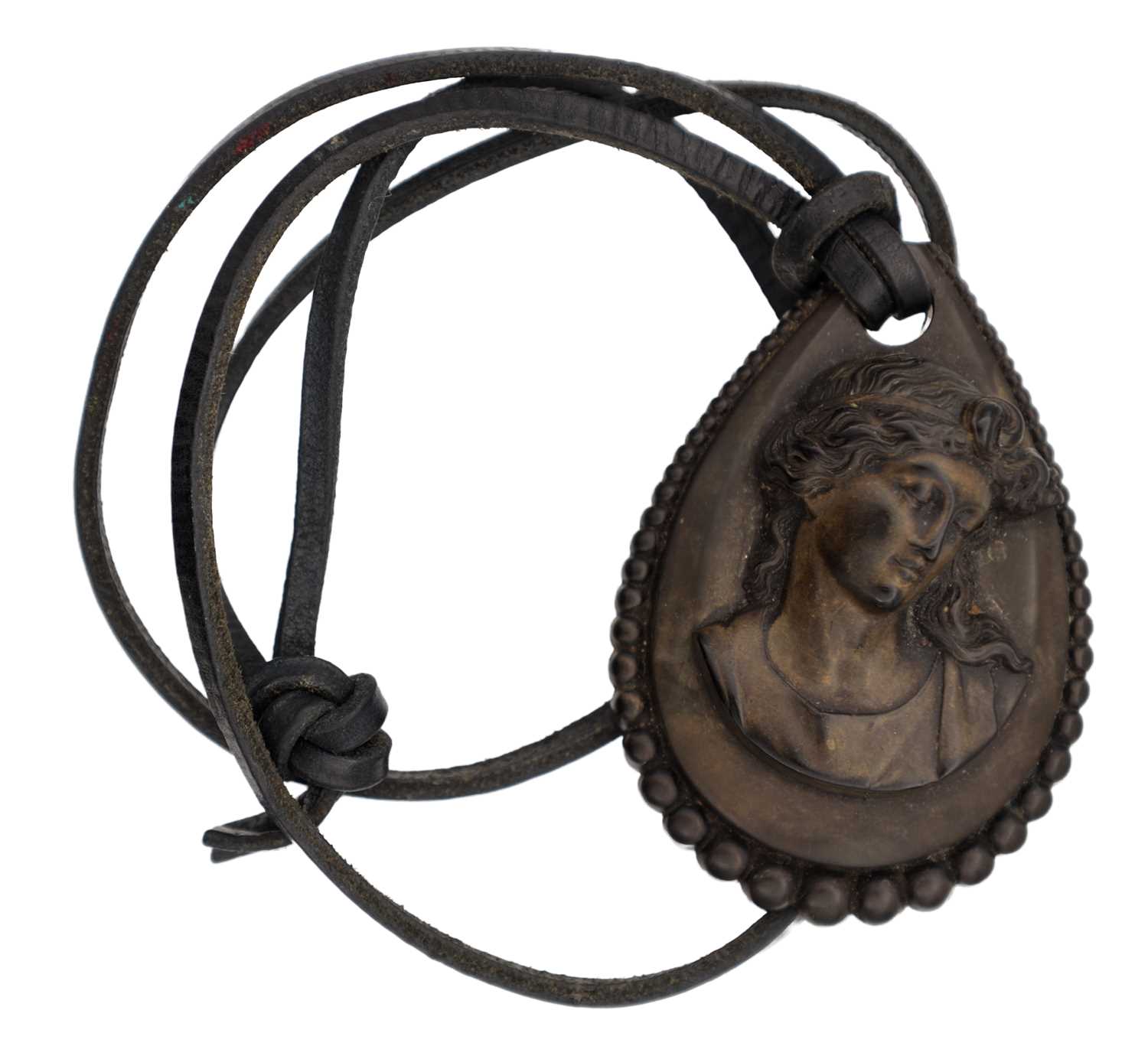 Lot 310 - A VICTORIAN VULCANITE CAMEO PENDANT