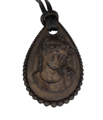 Lot 310 - A VICTORIAN VULCANITE CAMEO PENDANT