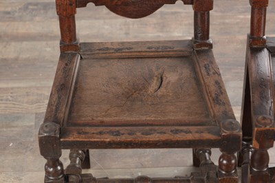 Lot 1558 - A PAIR OF 17TH CENTURY ENGLISH OAK HALL CHAIRS